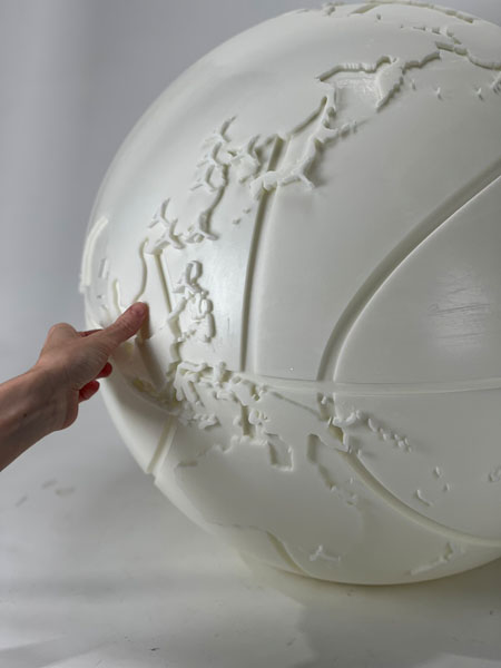 High-quality fabricated brand display piece created with large-scale 3D printing for commercial and event marketing.