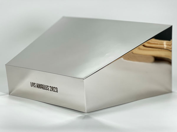 High-quality fabricated brand display piece created with large-scale 3D printing for commercial and event marketing.